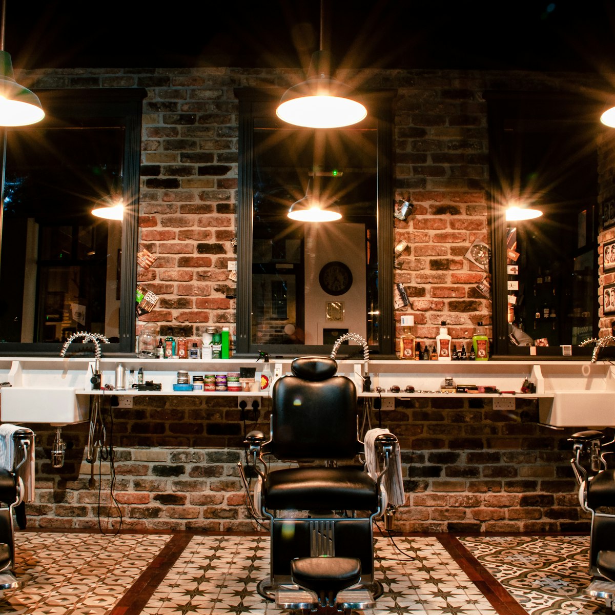 Barbershop interior with a leather chair under warm lights